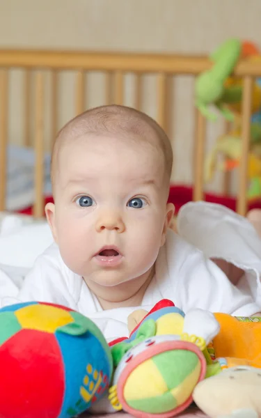 Baby looking surprised at camera — Stock Photo, Image