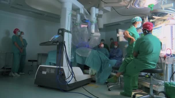 Doctors Using Surgical Machine Operation — Vídeo de stock