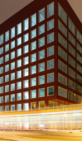 Modern office building at night — Stock Photo, Image