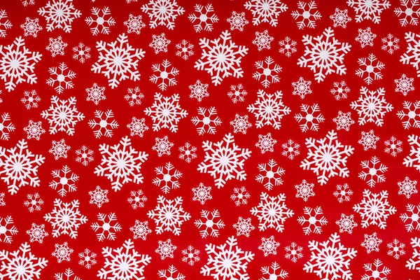Fiocchi Neve Bianchi Uno Sfondo Rosso Carta Imballaggio Natale Concetto — Foto Stock
