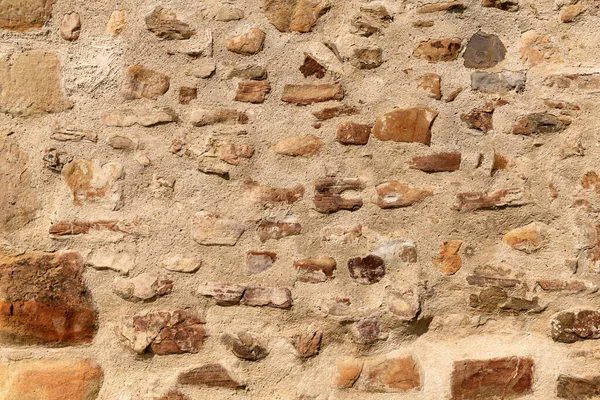 Fechar Acima Parede Pedra Velha Com Argamassa Grossa Superfície Texturizada — Fotografia de Stock