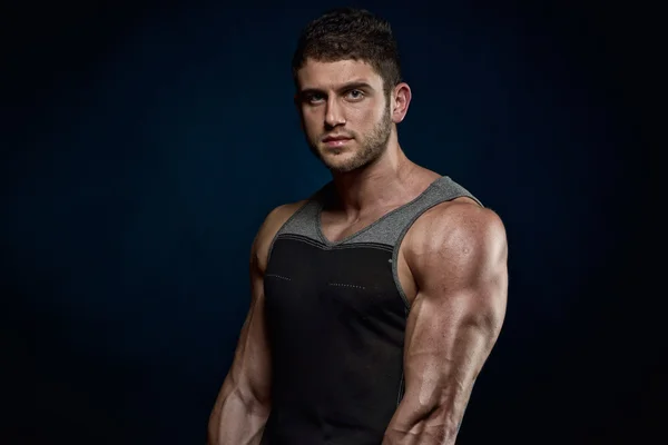 Athletic young man portrait in studio — Stock Photo, Image