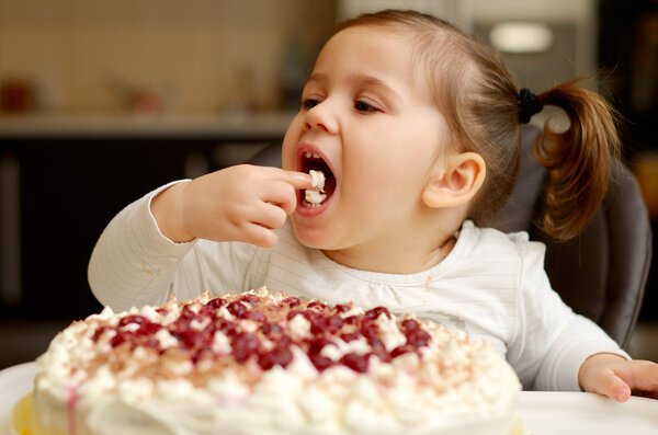 cute little girl eating