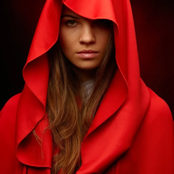 Beautiful woman with red cloak — Stock Photo, Image