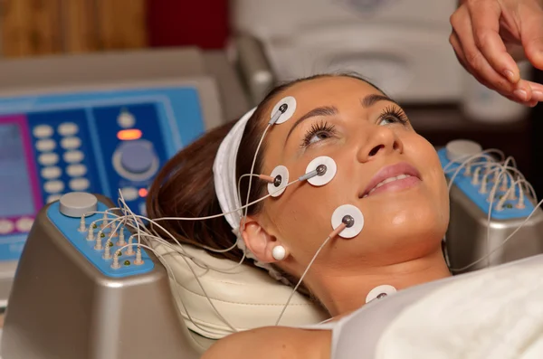 Young woman during cosmetic treatment — Stock Photo, Image