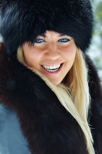 Pretty smiling woman portrait outdoor in winter Stock Photo