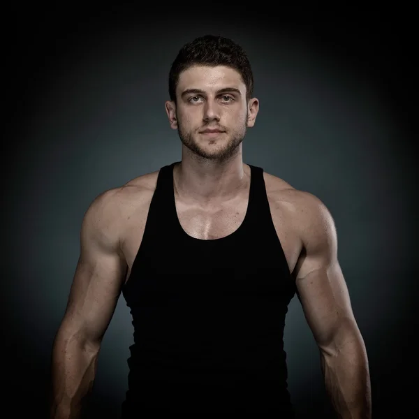 Athletic young man portrait in studio — Stock Photo, Image