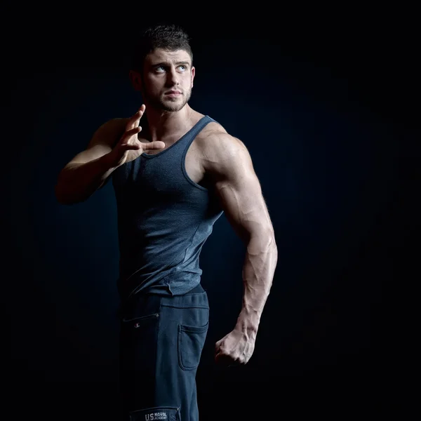 Athletic young man portrait in studio — Stock Photo, Image
