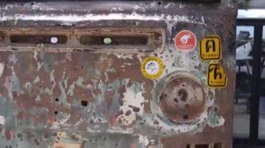 Old And Rusty Car Frontage - Static, Then Zoom Out