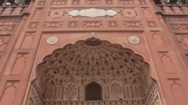 Building Frontage And People Near Entrance - Tilt - Up To Down