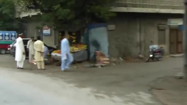 Driving Old Houses Cars People Street Slide Right Left — Stockvideo