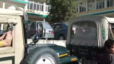 Passing By Cars And People In Street - Slide - Left To Right