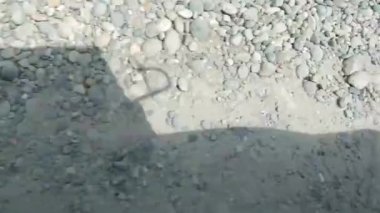 Car Shadow On Rocks While Driving - Slide - Left To Right 