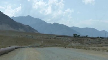 Driving On Road On Way To Mountains - Slide Forward 