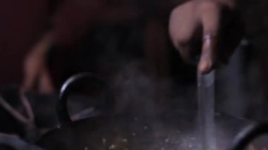 Food Stirred In Cooking Pot Near Man With Strabismus - Tilt - Down To Up