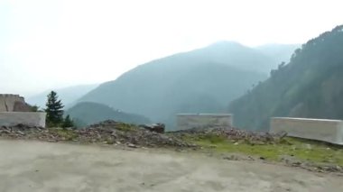 Passing By Blocks And Flora On Mountains - Slide - Left To Right 