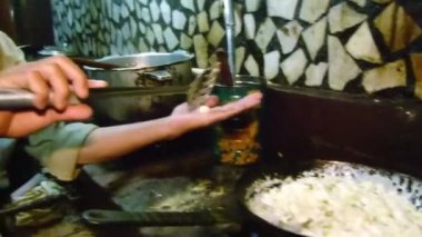 Chef Tasting Mixture And Approving - Pan Left Then Right