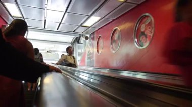 Going Up Escalator Of Bangkok Subway Station And Onto Street - Slide Forward