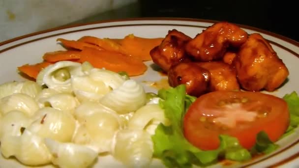Dinner Served Carrots Tomato Salad Chicken Pasta Handheld — Vídeo de Stock