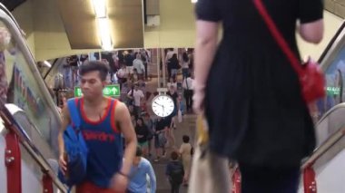People Taking The Stairs Near Escalators In Busy Thai Subway Station - Static