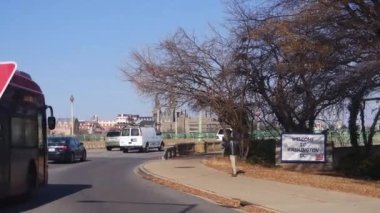 Person Walking Near Cars On Road - Static