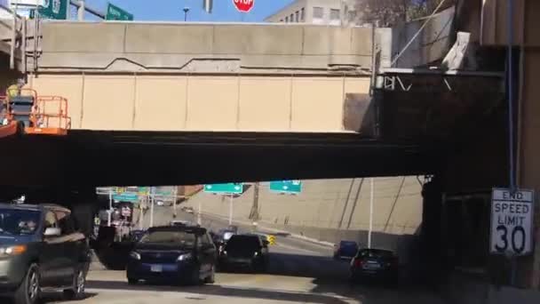 Passing Bridge Road Buildings Slide Forward — стоковое видео