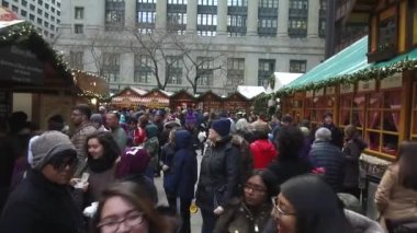 Christmas Market Crowd Near Stands - Slide Backwards