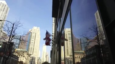 Flags In The Wind On Building In Street - Slide - Right To Left