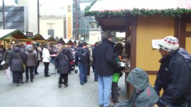 People Near Christmas Market Stands - Pan - Right To Left