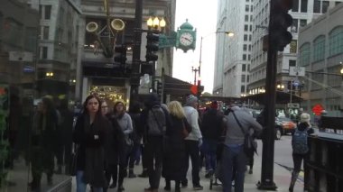 People Walking In Street Near Green Light - Slide Forward - Slow Motion