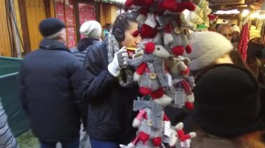 People Walking Near Christmas Market Stands - Slide - Right To Left