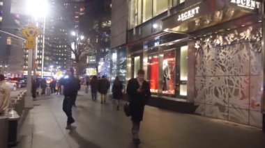 Busy Street And Shops At Night - Pan - Right To Left