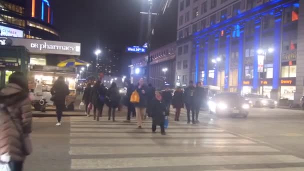 People Crossing Street Zebra Crossing Surrounded Buildings Pan Right Left — стоковое видео