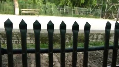 Passing By Spiky Fence - Slide - Right To Left