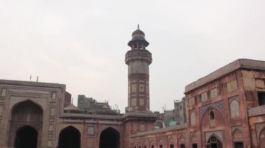 Mosque Walls From Inside - Tilt Up To Down Then Pan Left To Right