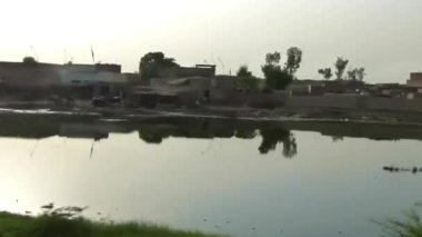Passing By Water Source And Flora - Slide - Left To Right