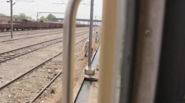 Passing By Train Station Rails - Slide - Right To Left