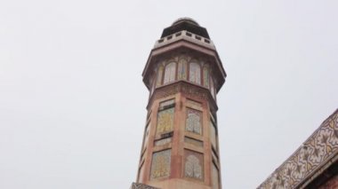 Mosque Tower And Walls - Tilt - Up To Down
