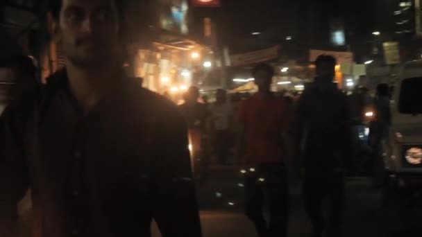 People Walking Motorbike Busy Street Night Pan Right Left — Vídeos de Stock