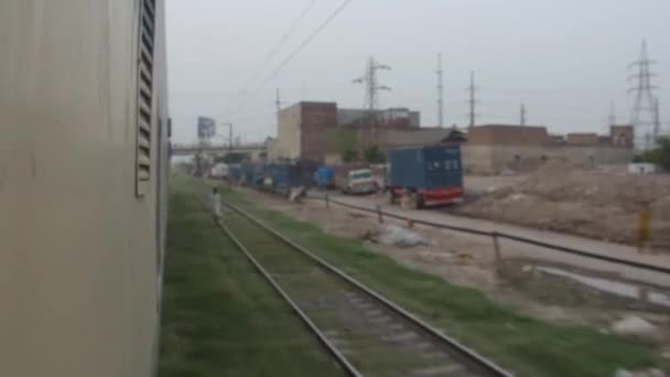 Person Walking Train Rails Trucks Slide Right Left Pan Left — Αρχείο Βίντεο