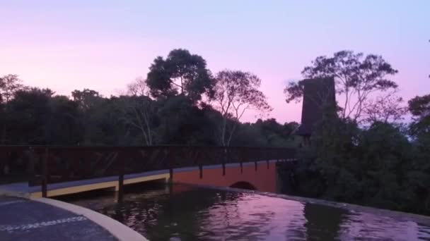 Beautiful Water Source Bridge Sunset Colors Handheld — 비디오