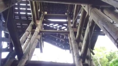 Wood Foundation Under Stairs From Below - Slide - Right To Left.