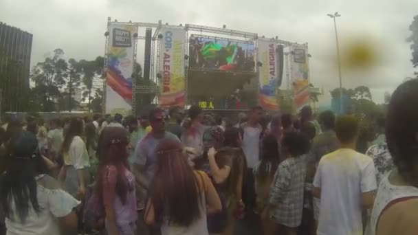 People Covered Colorful Powder Dancing Front Stage Handheld — Vídeo de Stock