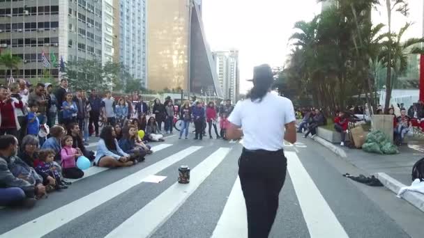 Man Performing Michael Jackson Zebra Crossing Slide Left Right — Stock Video