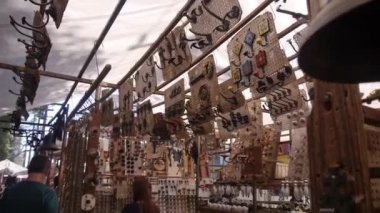 Souvenir Shop In Market - Tilt - Up To Down, Then Down To Up