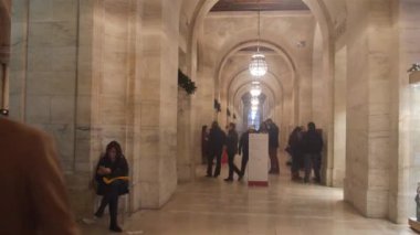  People Reading Inside Library - Static