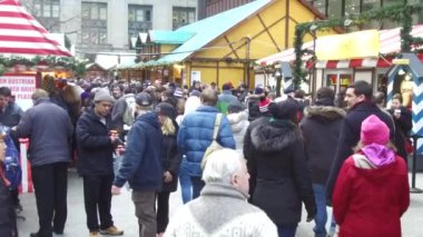  People Walking From The Back In Christmas Market - Static - Slow Motion.