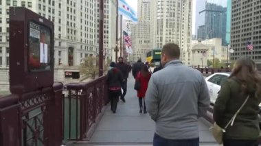  People Walking On Bridge Near Flags And Cars - Slide Forward
