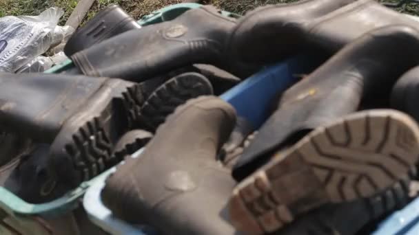 Boots Piled Koszyku — Wideo stockowe