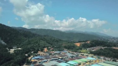 Mountain With Forest Next To A City - Drone Shot 